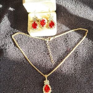 Elegant Gold and Red Jewelry Set.